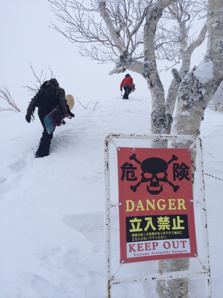 Rene Bruner and Jarryd Hughes hiking in the back country of Furano Japan